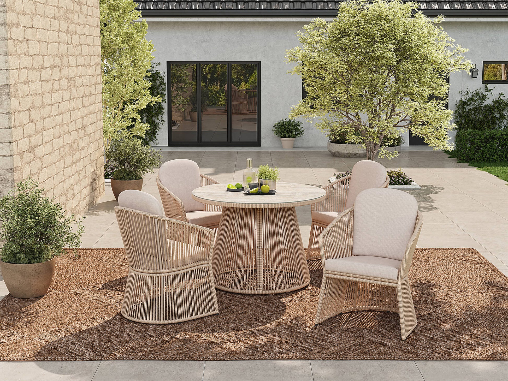 Outdoor patio dining set for 4 with wicker swivel chairs and a round glasstop dining table
