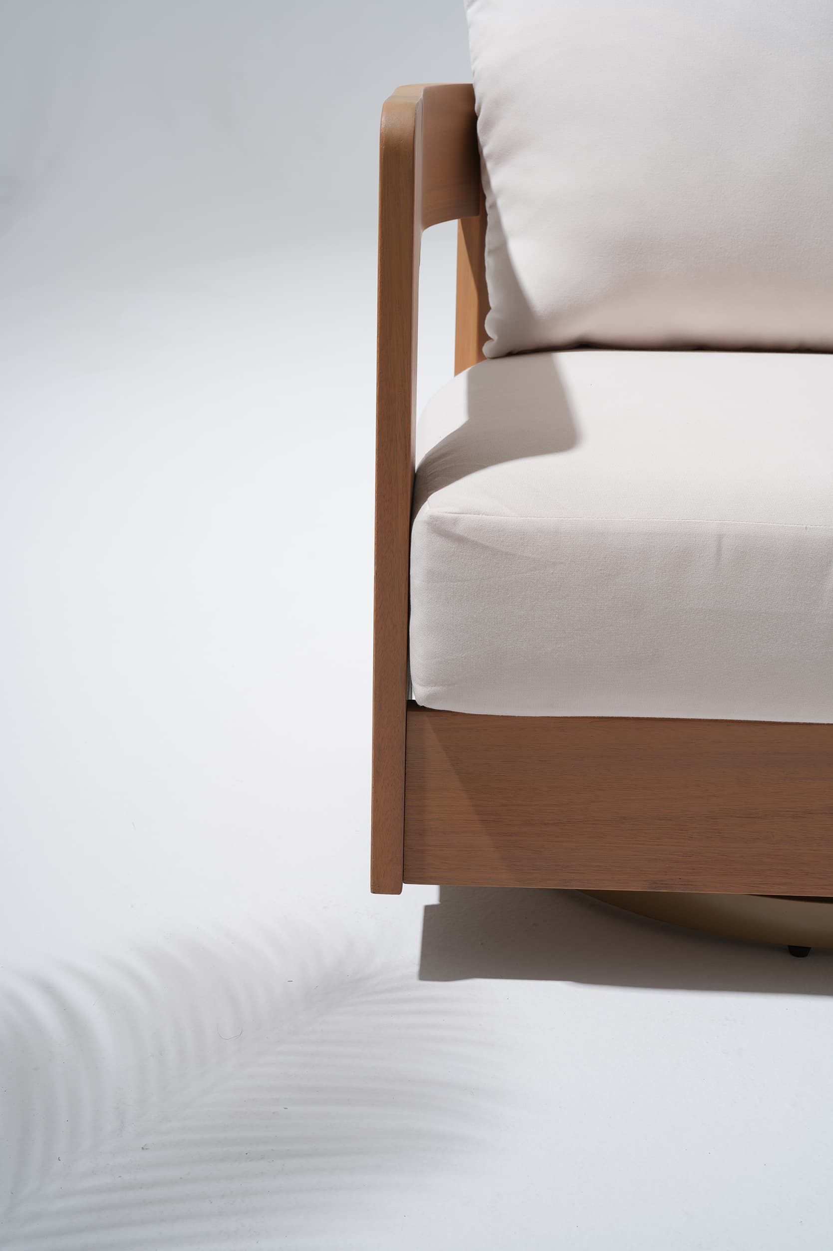 swivel chair armrest and wooden frame detail