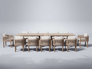 Outdoor furniture dining set for 12 people with a large wooden table and matching chairs
