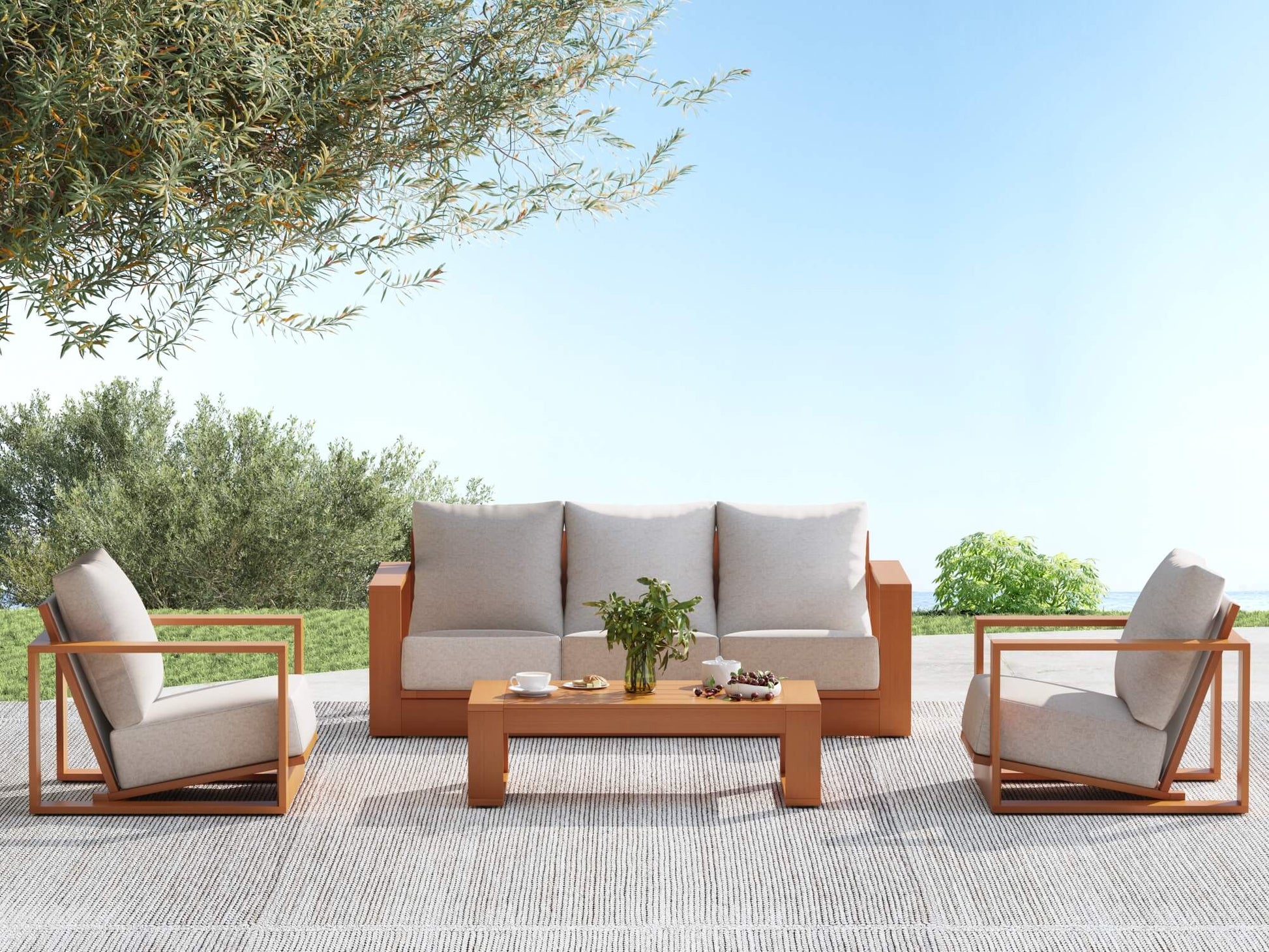 Drift 4-pc Outdoor furniture conversation set with 3-seat sofa, two armchairs, and a coffee table