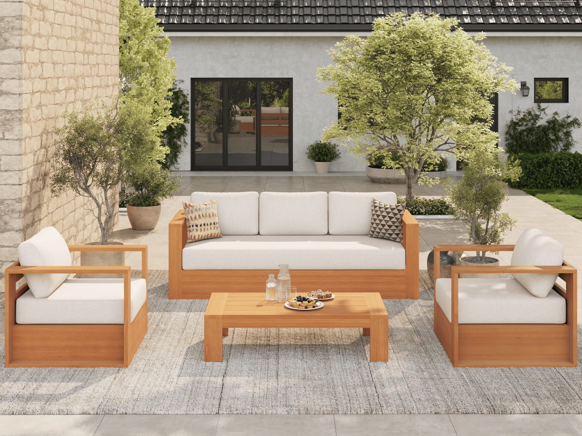 Outdoor patio furniture set with wooden frames and white cushions on a patio- SUNSITT outdoor conversation seating set