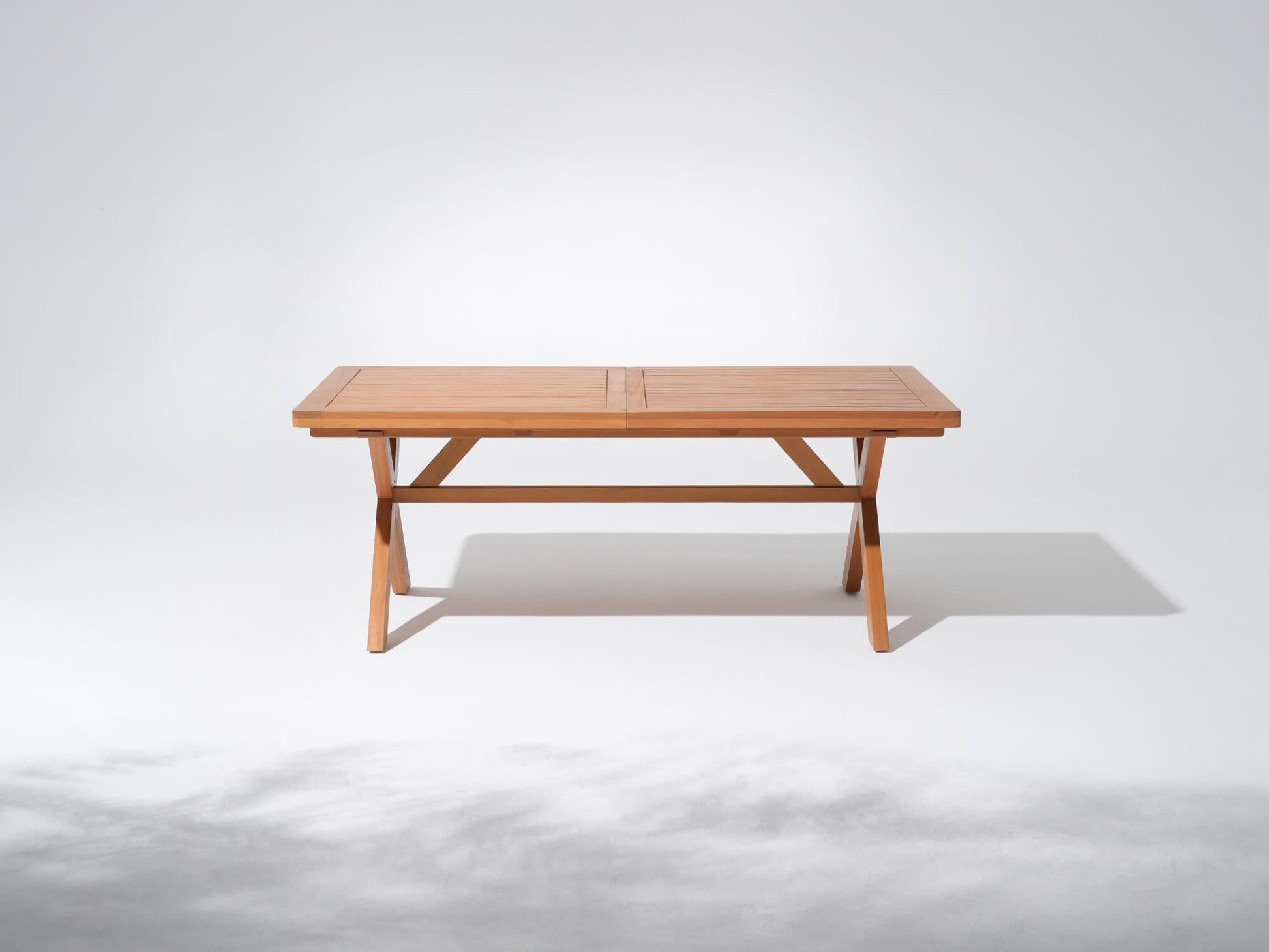 extandable eucalyptus Wooden dining table with X-shaped legs  - Sunsitt’s Modern Premium Outdoor Furniture