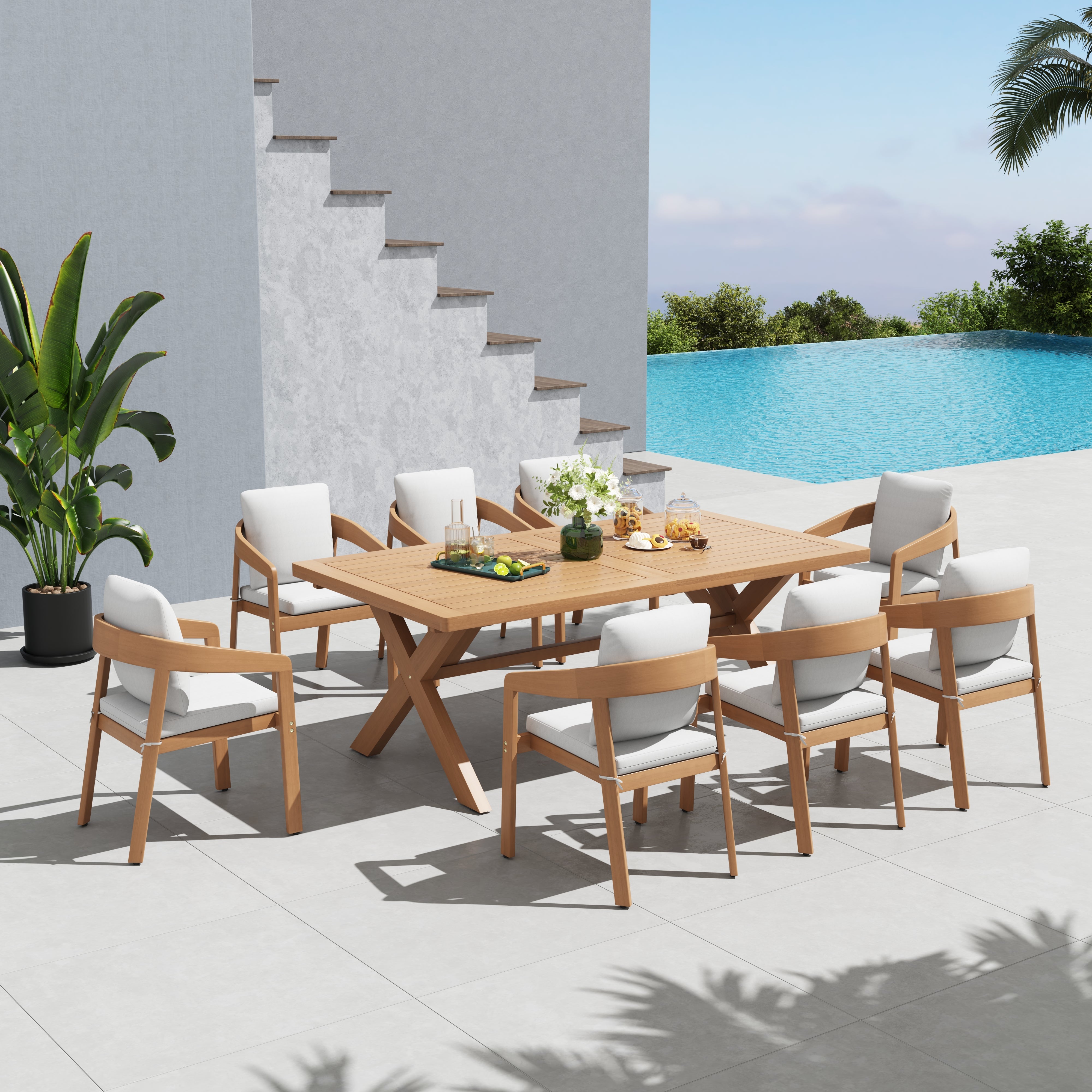Foristern Outdoor dining set with eucalyptus wooden table and chairs by a poolside  - Sunsitt’s Modern Premium Outdoor Furniture