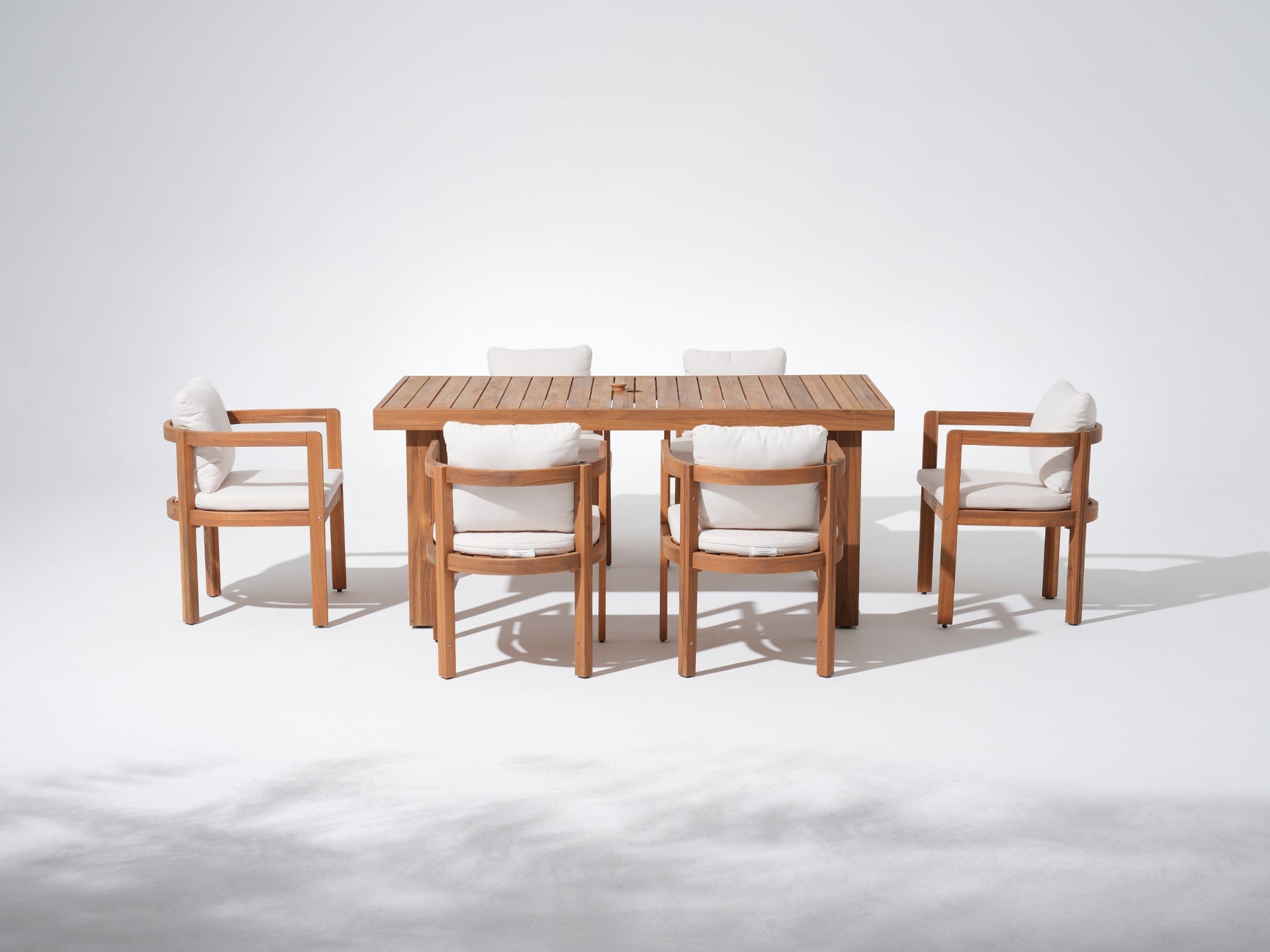 Wooden outdoor dining set for 6 with chairs and cushions, umbrella hole design