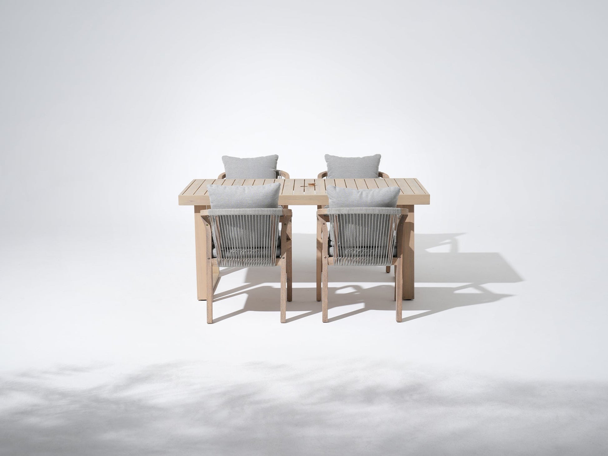 Thalea rectangular wood outdoor dining set for 4 people,  a 67'' table with umbrella hole and four wood armchairs with rope design