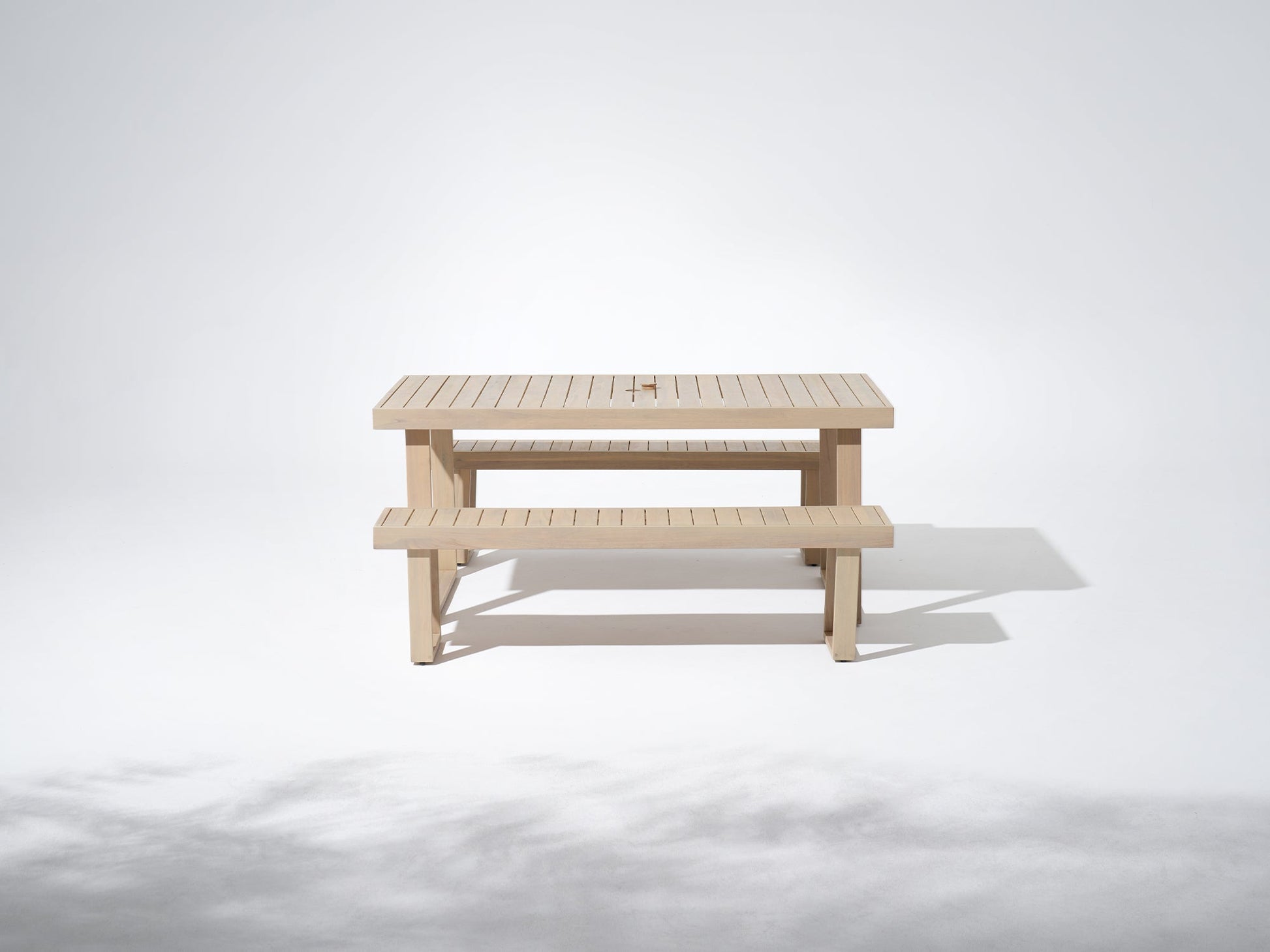 Wooden outdoor table with umbrella hole and two benches for 4 people
