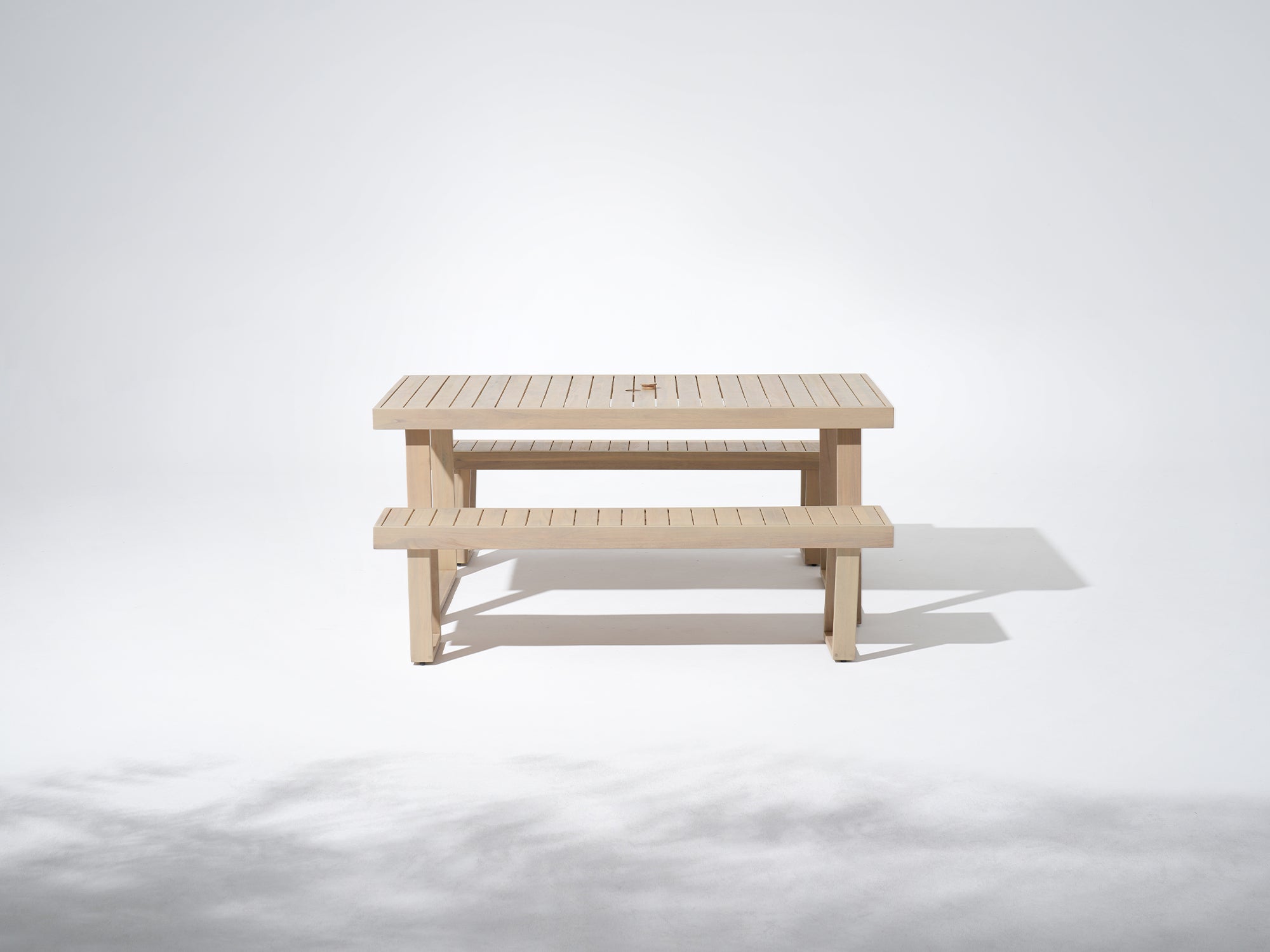 Wooden outdoor table with umbrella hole and two benches for 4 people