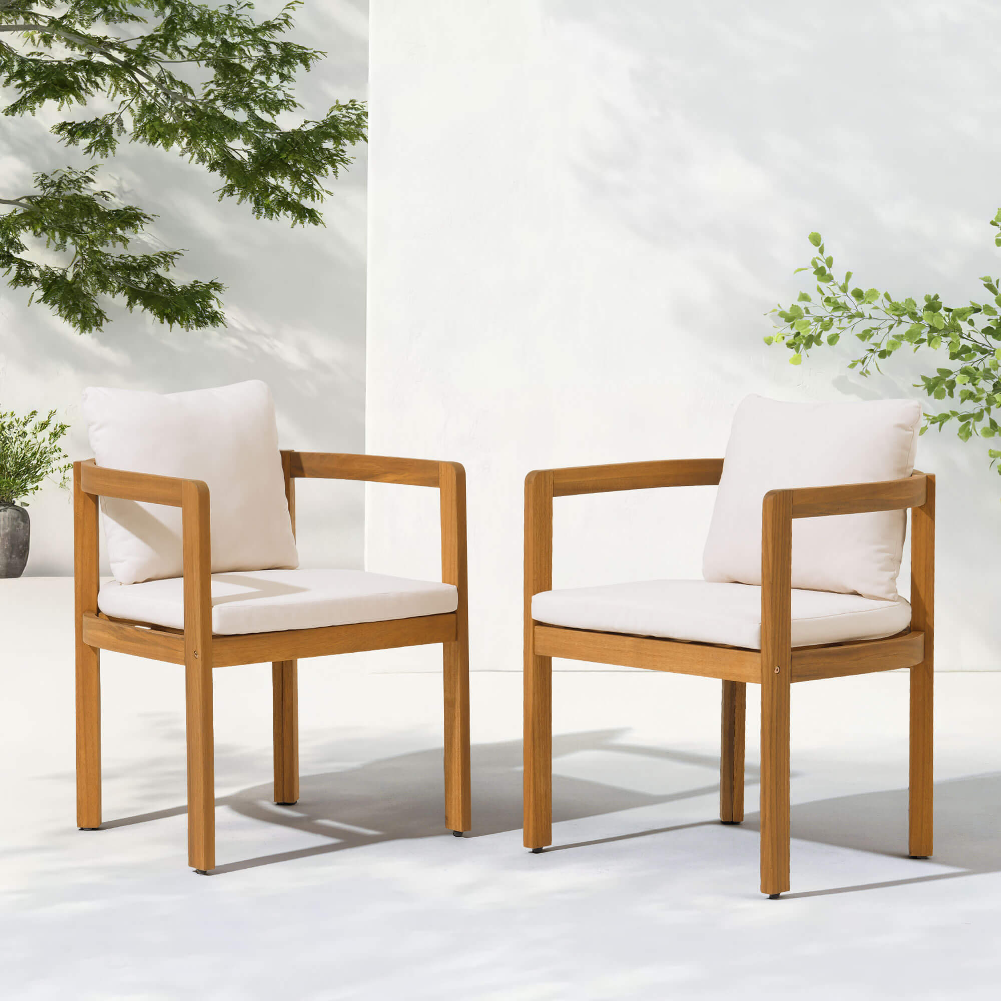 Two wooden outdoor dining chairs with white cushions- Sunsitt Modern Premium Patio Outdoor Furniture