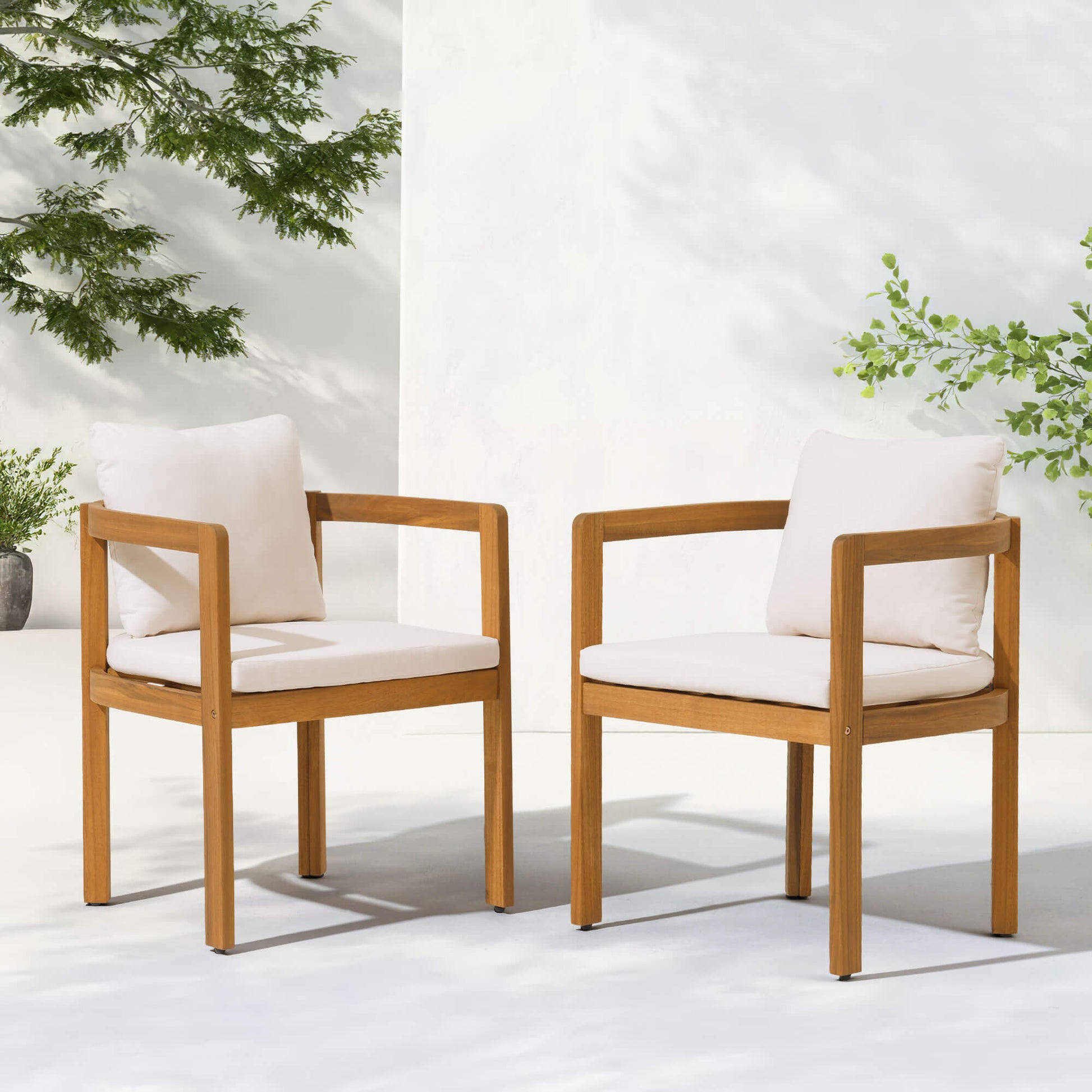 Two wooden outdoor dining chairs with white cushions- Sunsitt Modern Premium Patio Outdoor Furniture