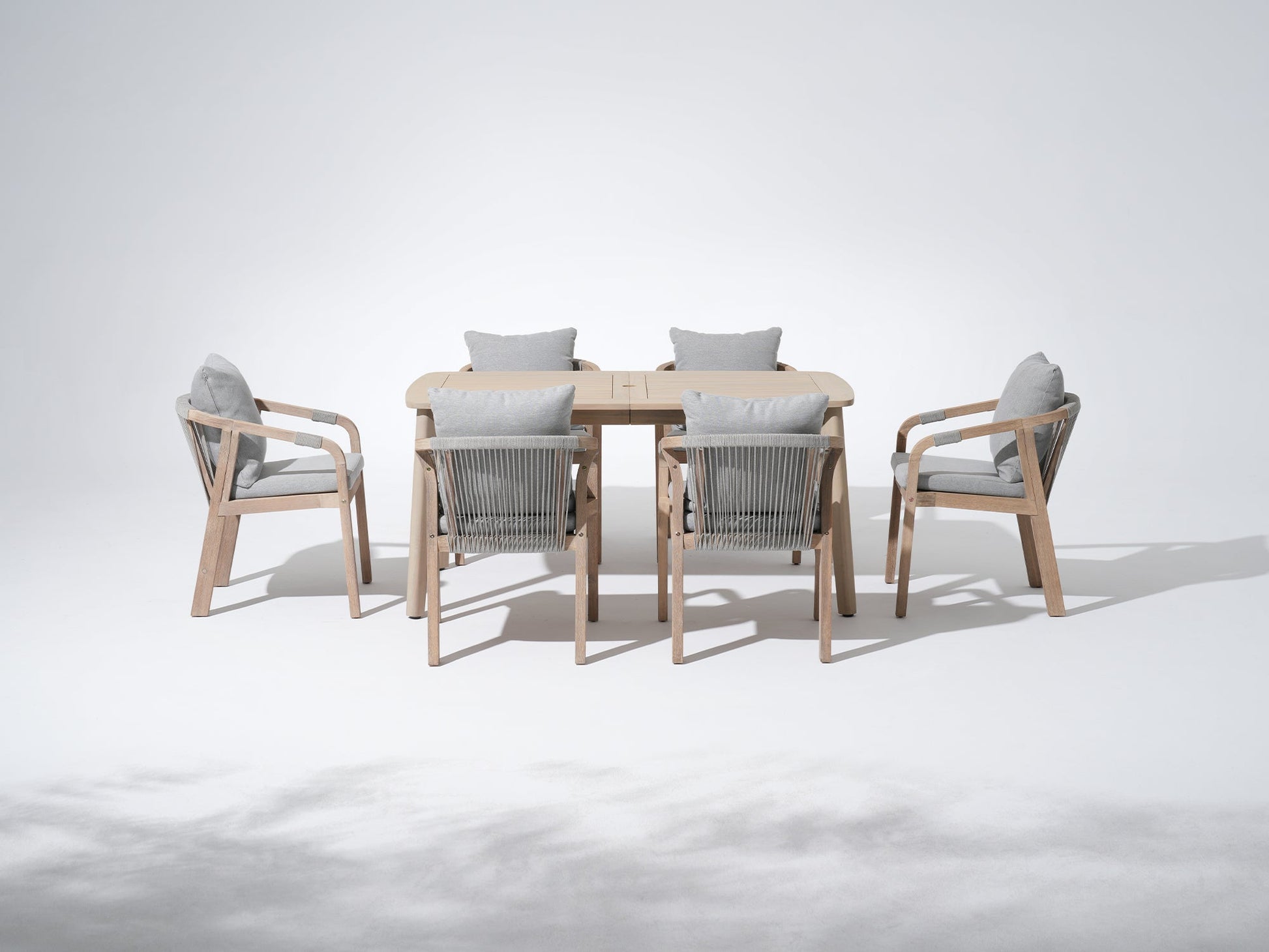 wooden Outdoor furniture dining set for 6 people with umbrella hole, rope design and gray cushions