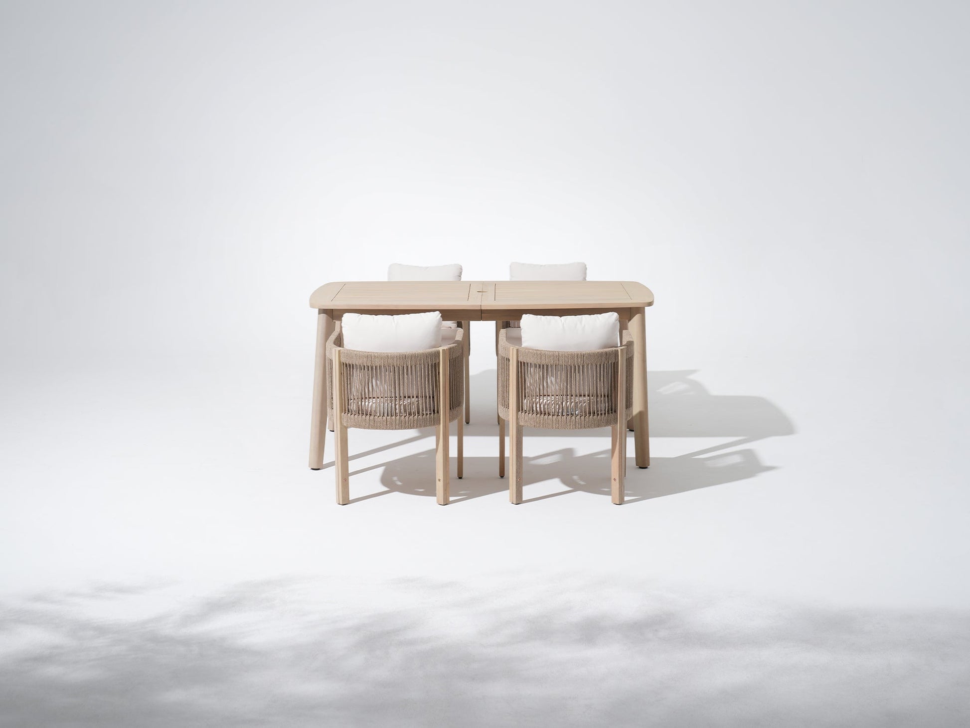 Wooden outdoor dining set for 4 with umbrella hole, a rectangular table and 4 chairs with cushions