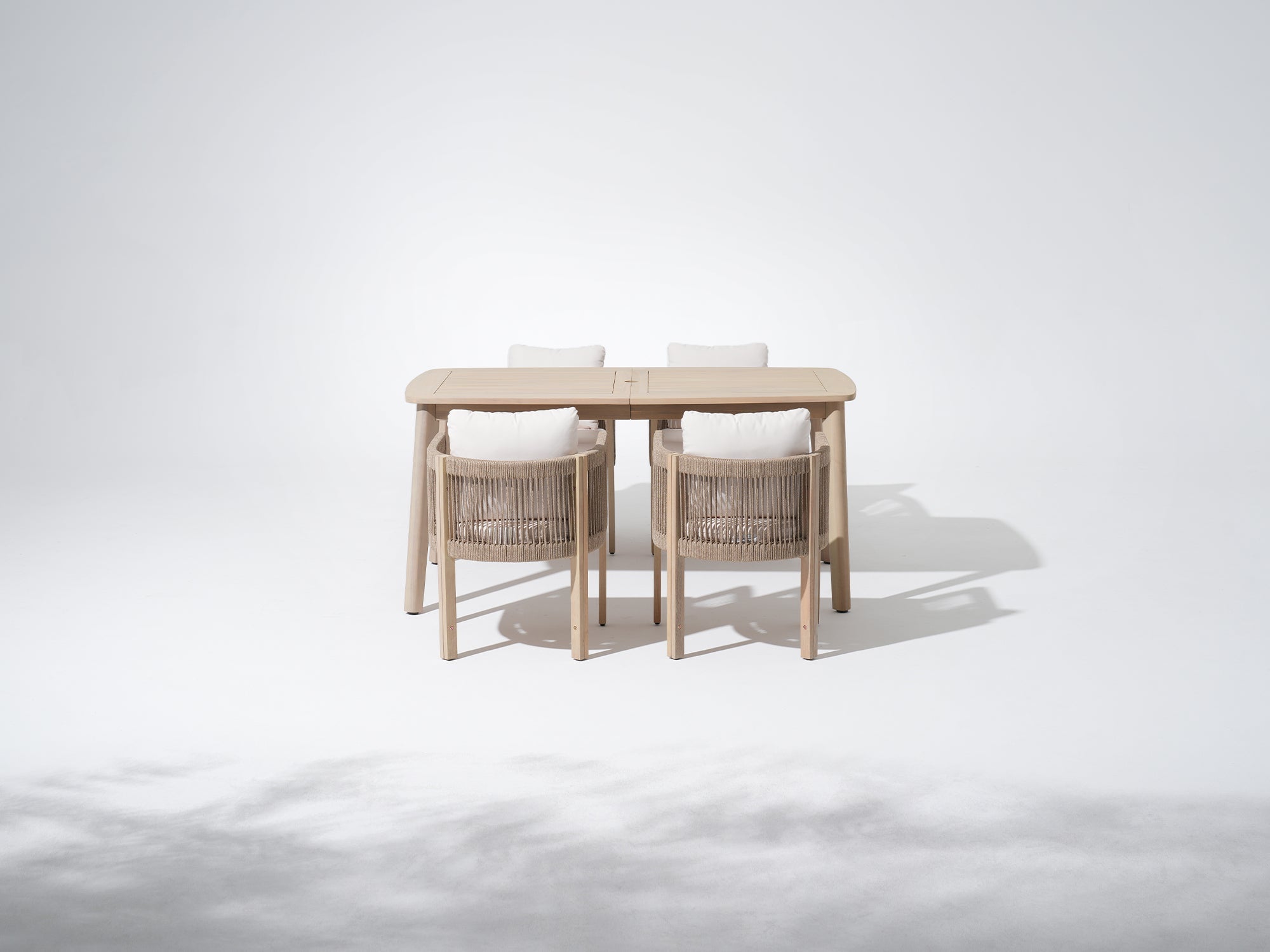 Wooden outdoor dining set for 4 with umbrella hole, a rectangular table and 4 chairs with cushions