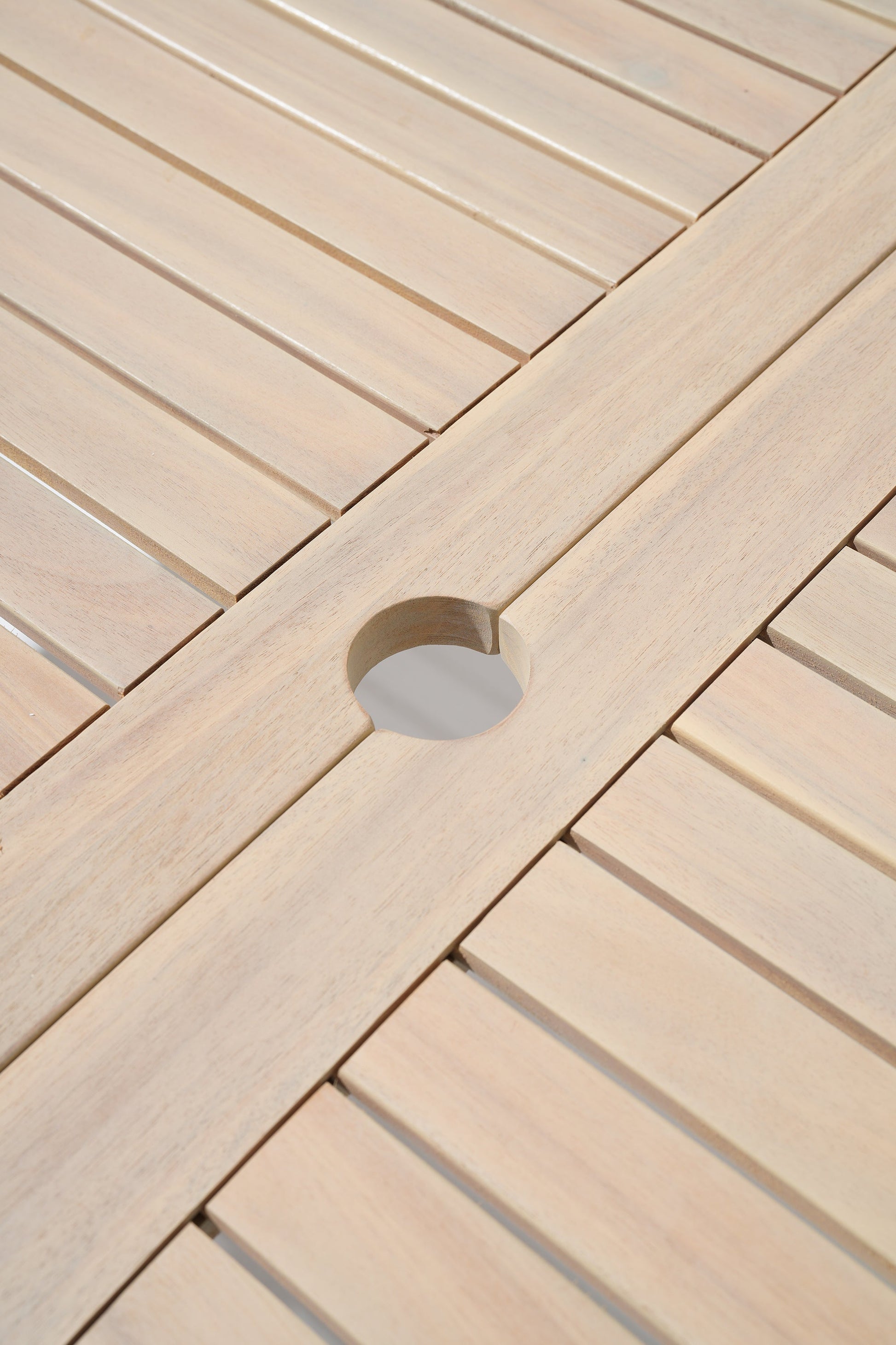 Close-up of wooden dining table with an Umbrella Hole