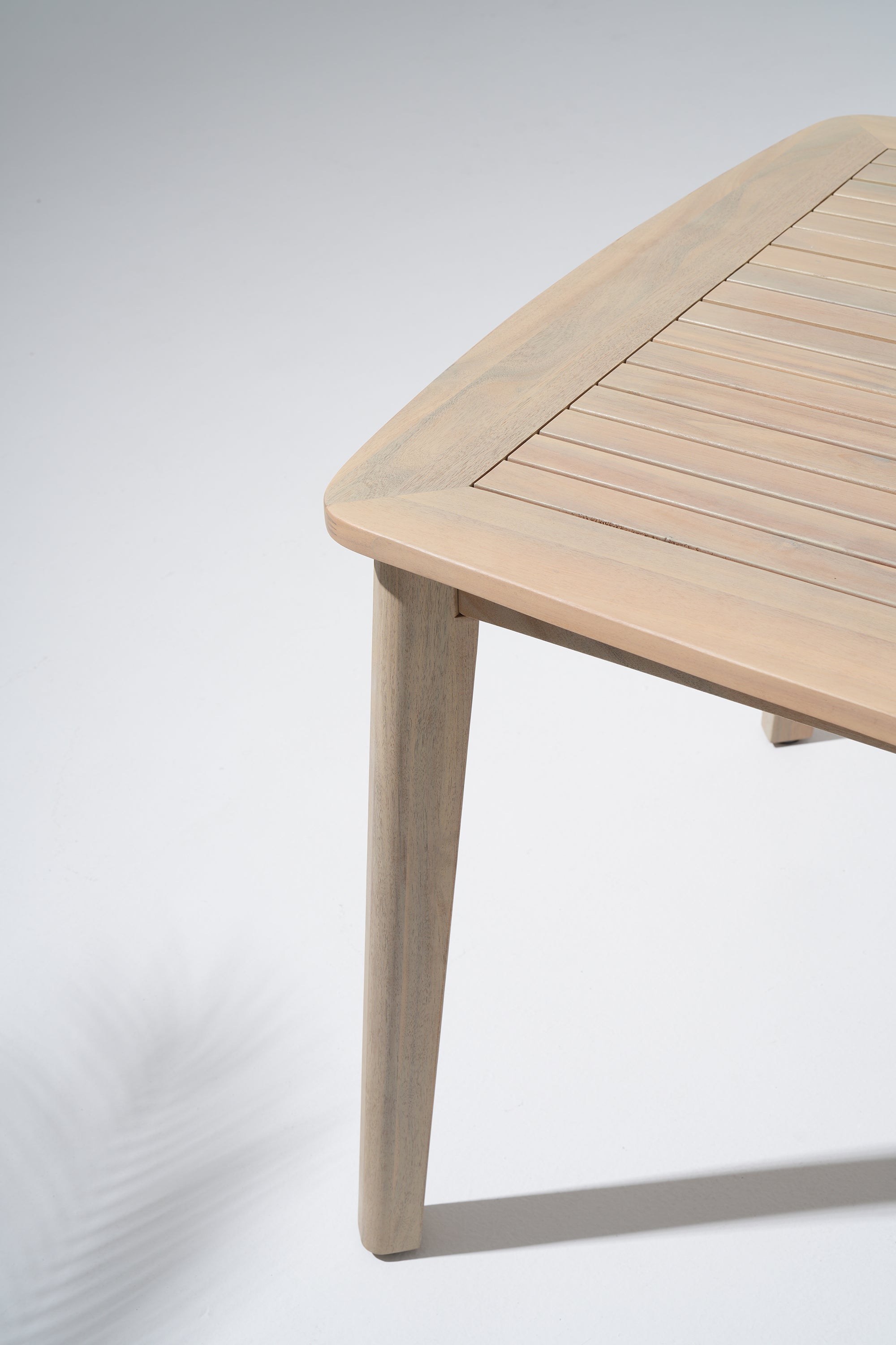 Thalea Wooden outdoor dining table with Umbrella Hole, tabletop detail