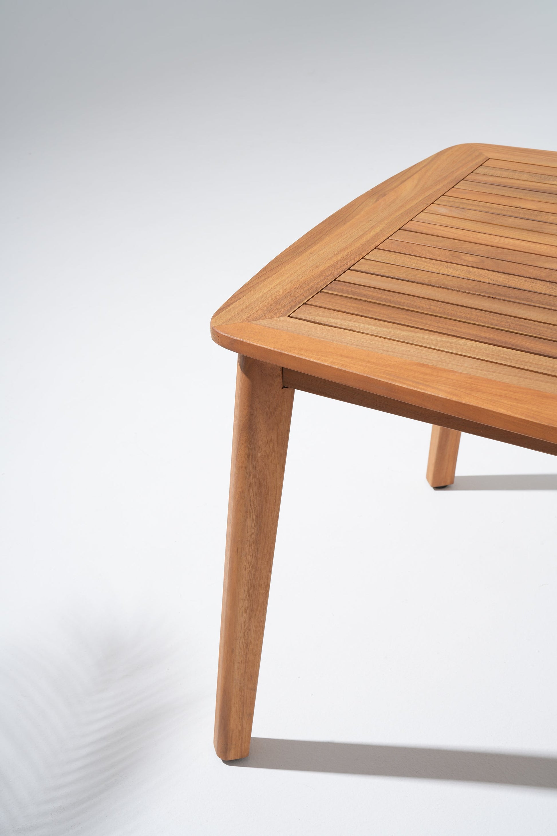 close up of Wooden table leg and tabletop