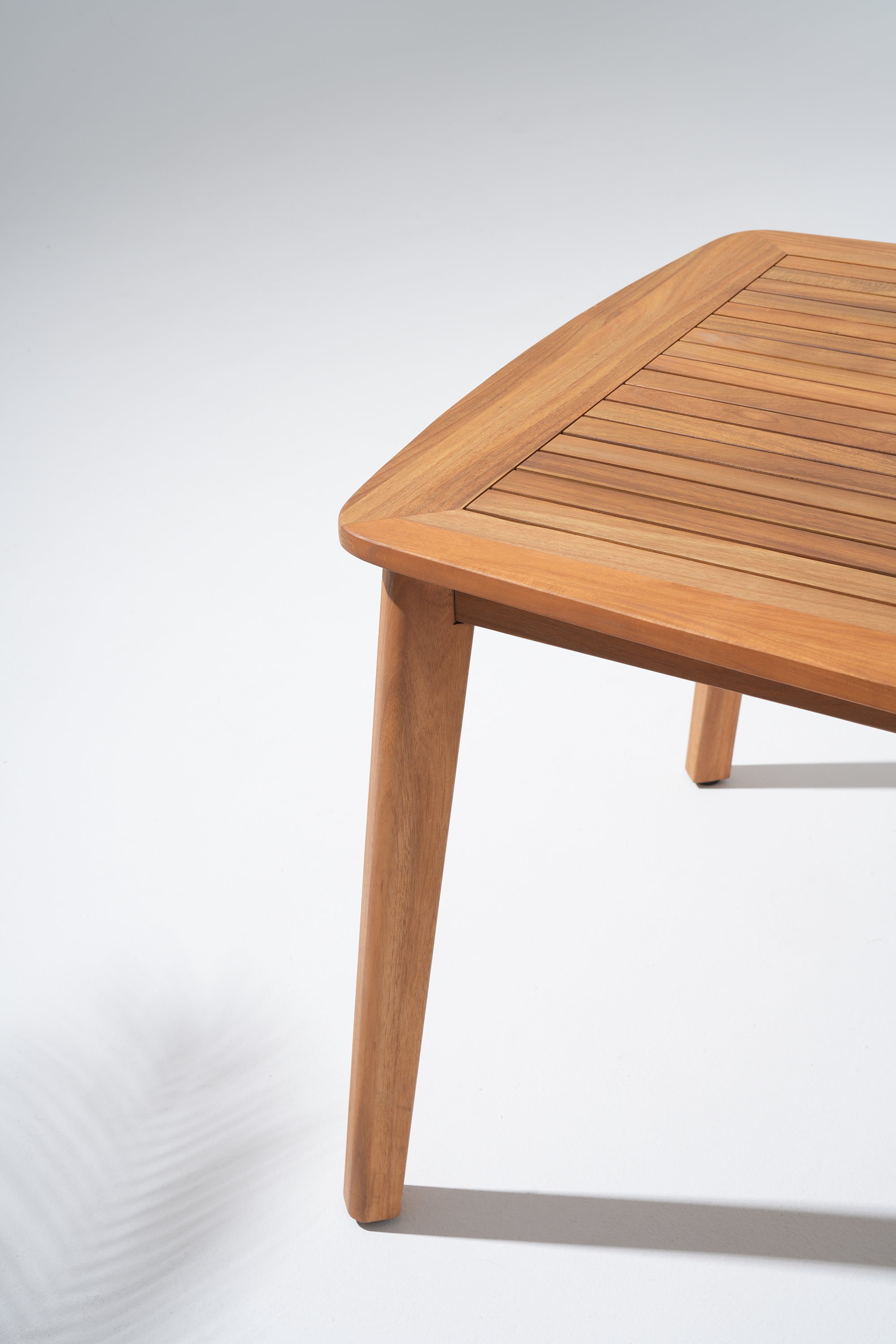 close up of Wooden table leg and tabletop