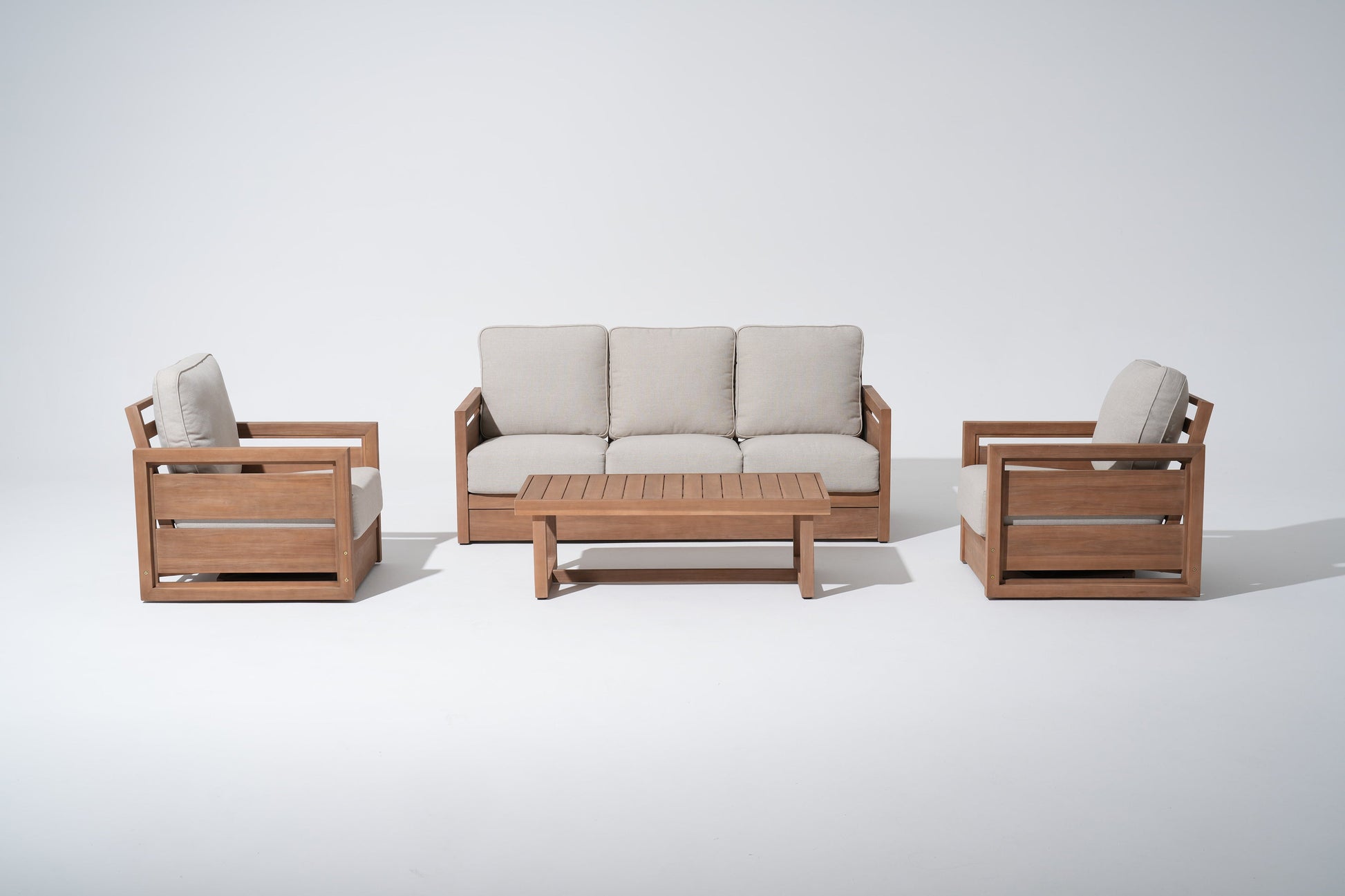 4pcs Wooden outdoor furniture set with beige cushions, a 3-seat sofa, two swivel chairs and a coffee table