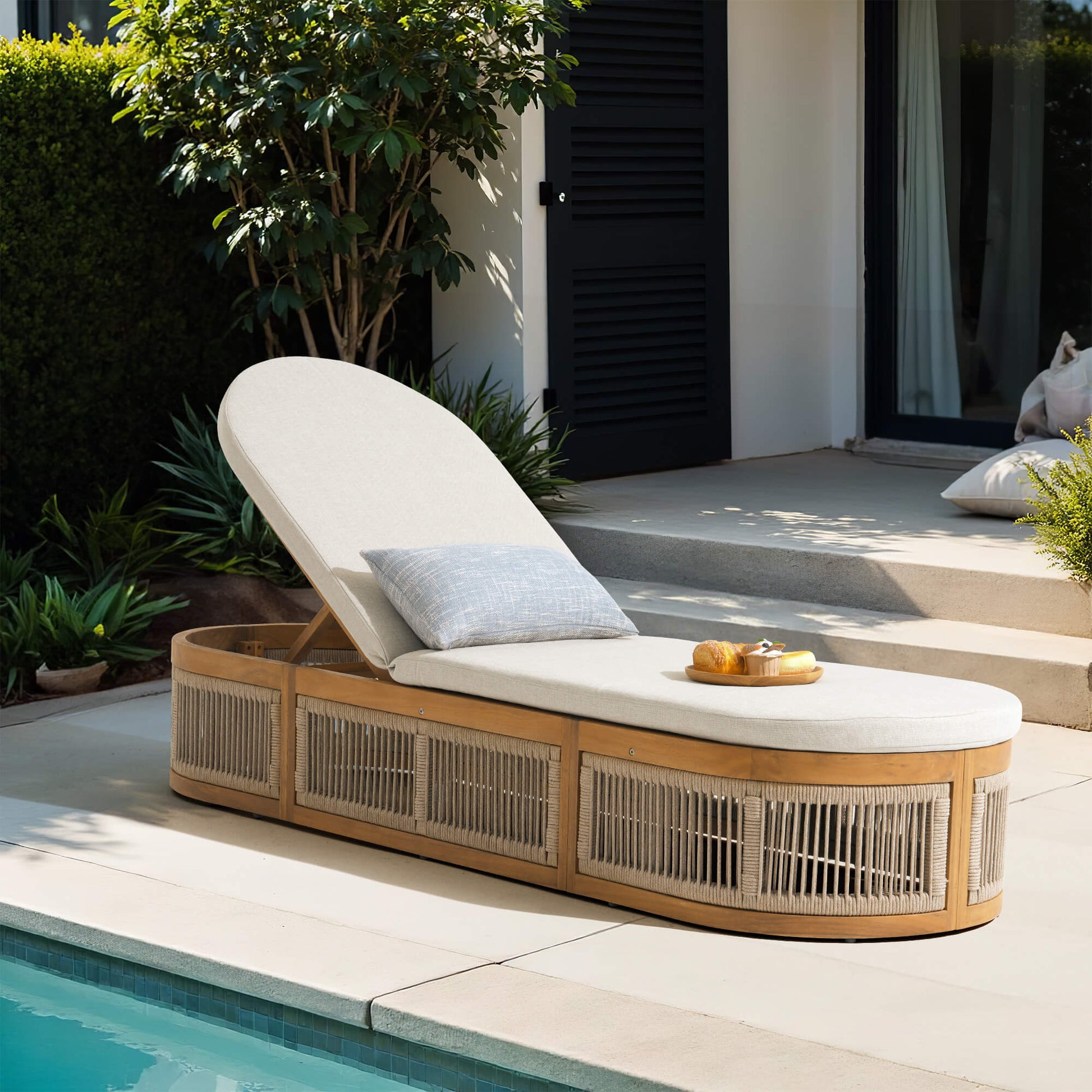 rope sun lounger with white cushion and wood frame