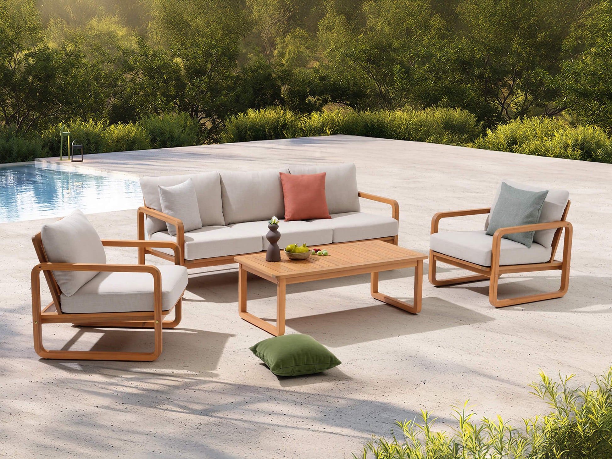 4-pc wood outdoor furniture conversation set with sofa, chairs, and coffee table by a poolside