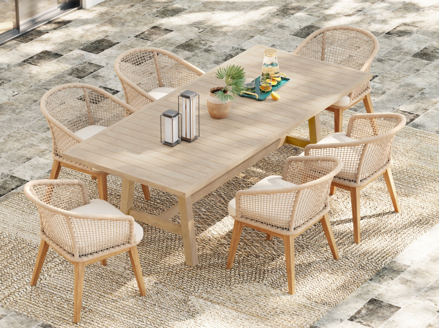 Outdoor dining set for 6 with a wooden table and wicker chairs on a textured patio- Sunsitt Modern Premium Patio Outdoor Furniture