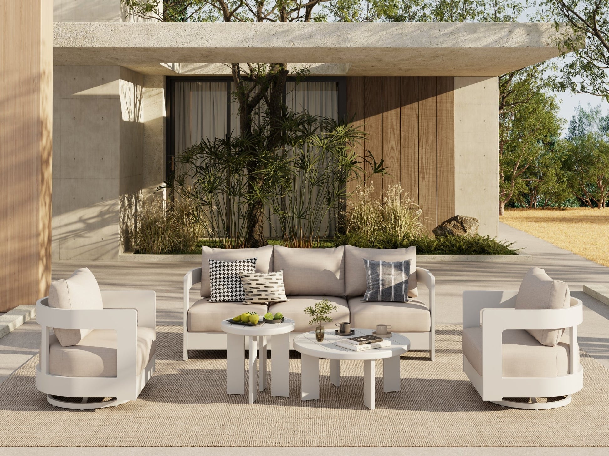 Modern outdoor furniture set with beige and white chairs and sofa in a stylish patio setting.