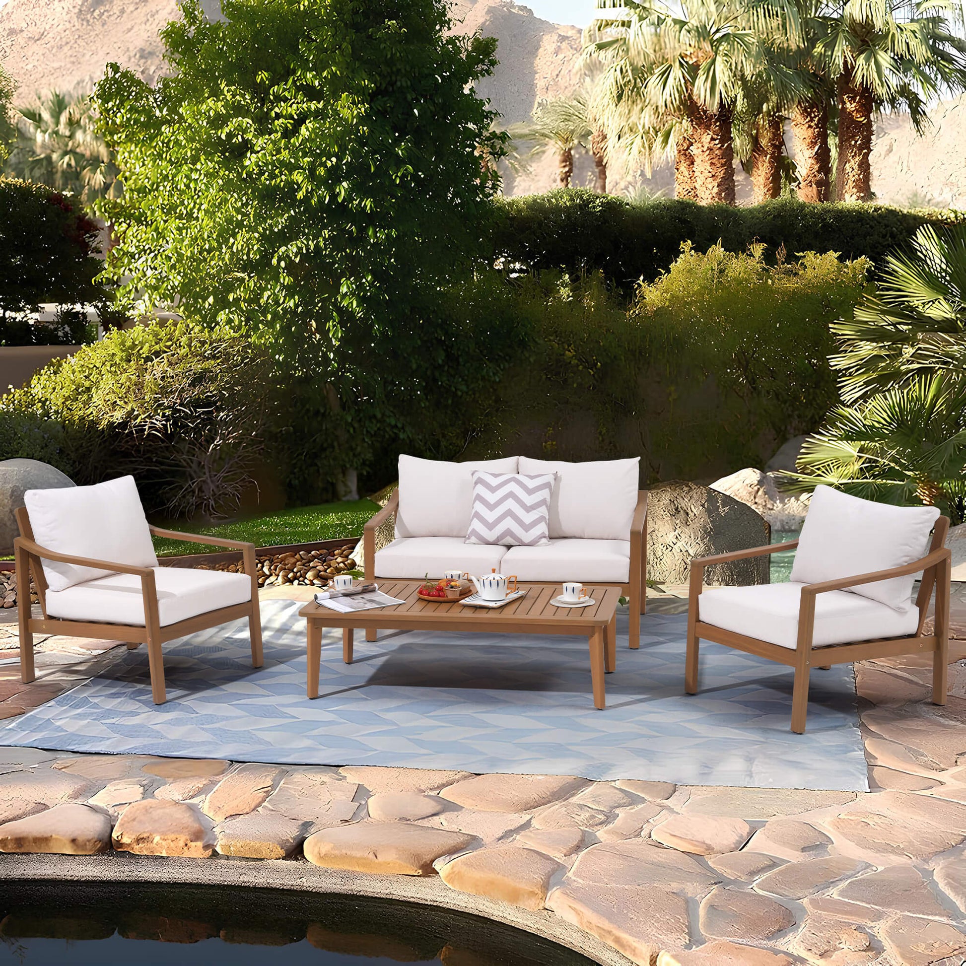 Noto 4 seats white Outdoor patio set with chairs and a table on a stone patio- Sunsitt Modern Premium Patio Outdoor Furniture