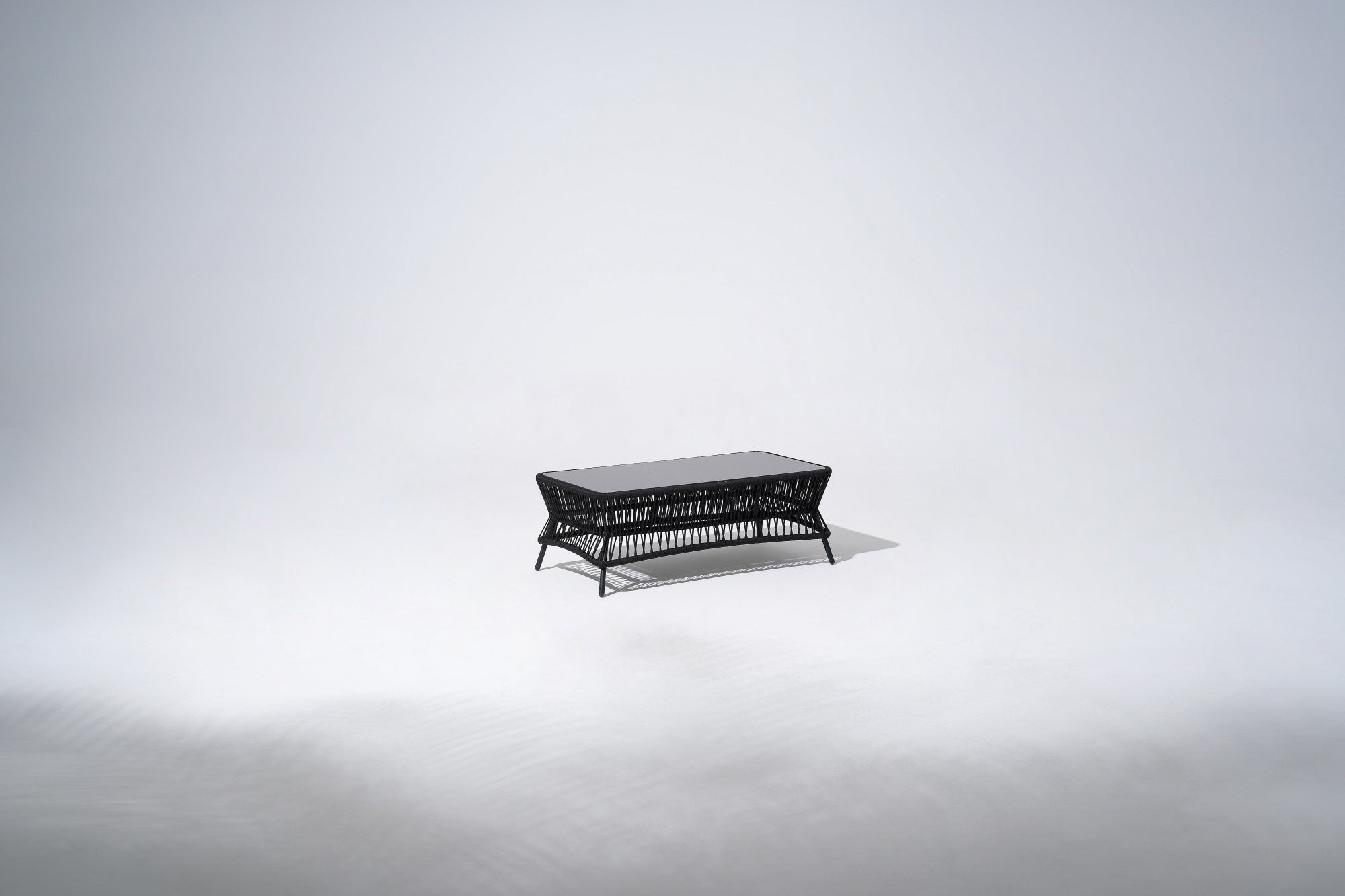 black aluminum rectangular outdoor coffee table, black rope design and Sintered Stone Top Table - SUNSITT Premium Modern Outdoor Patio Furniture