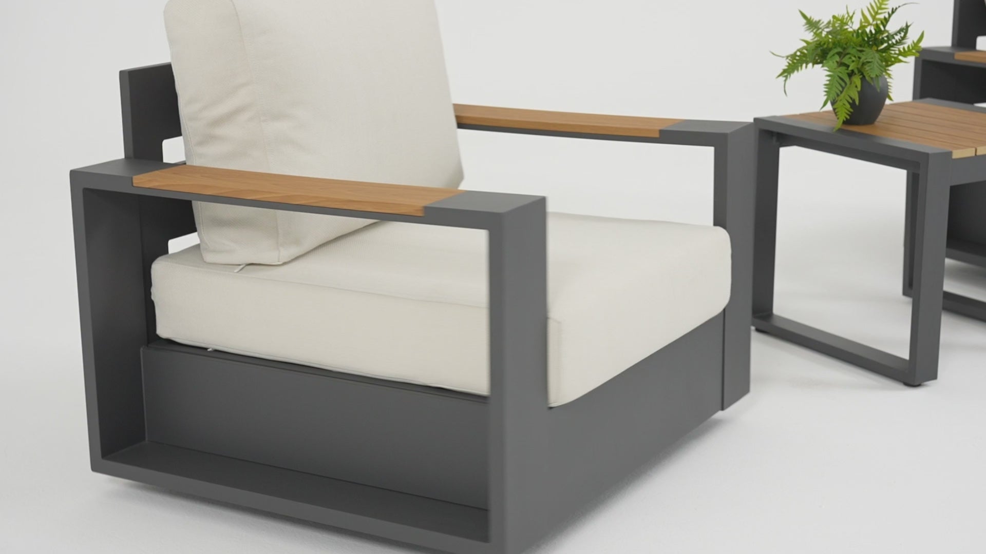 Load video: Addison modern outdoor aluminum swivel chairs with thick beige cushions