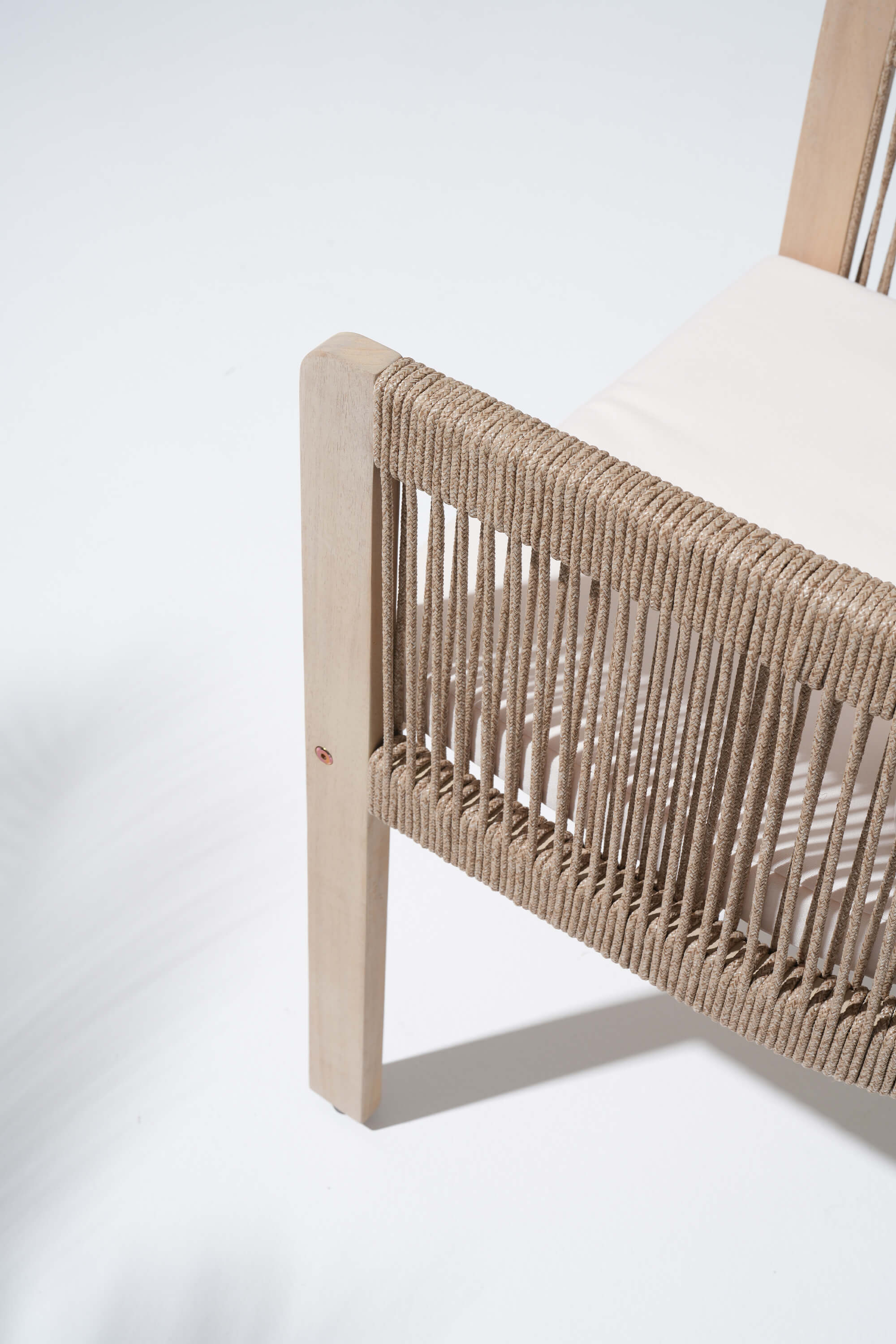 Close-up of a chair with woven rope backrest - Sunsitt Modern Premium Outdoor Patio Furniture