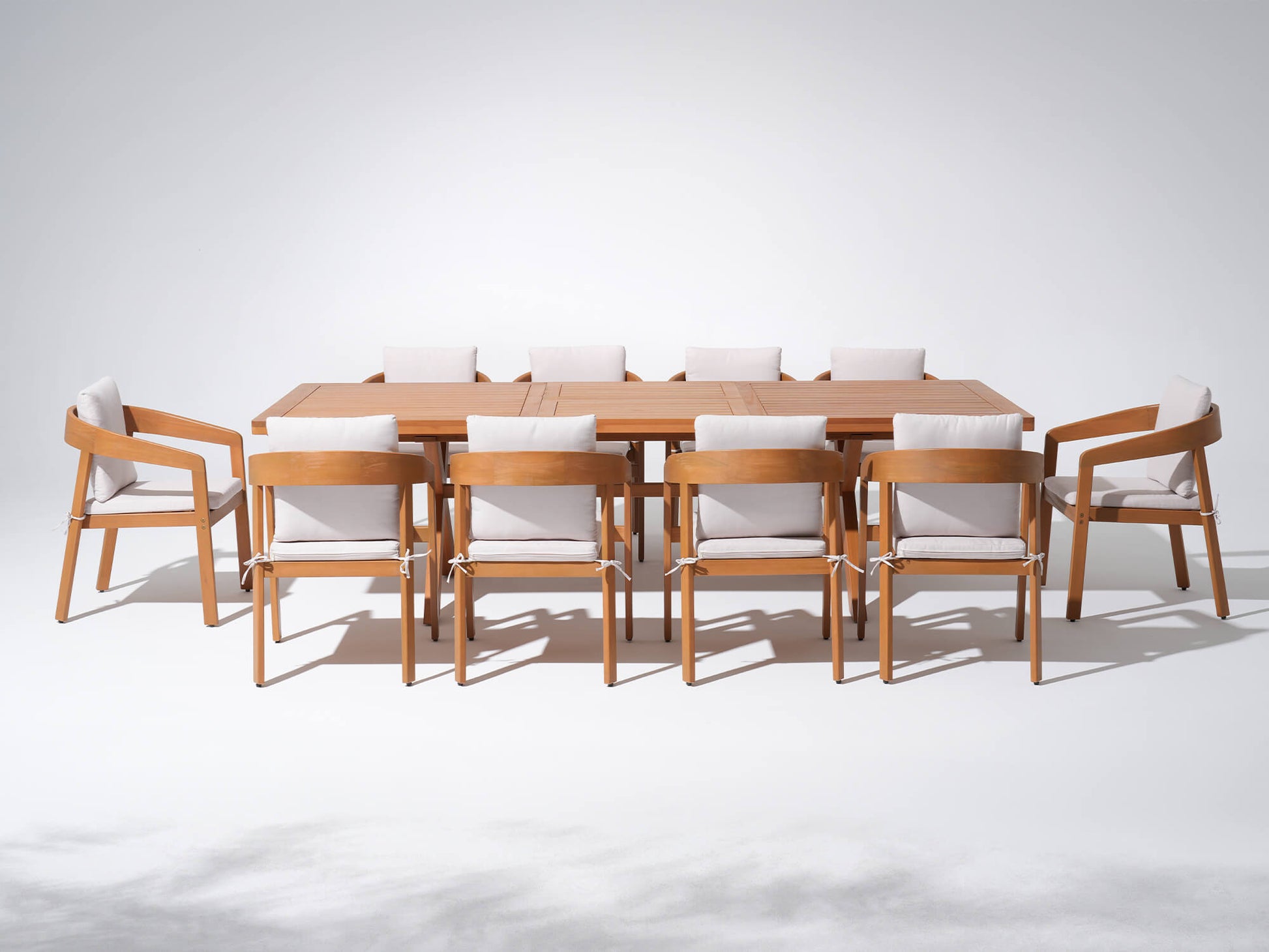 11pcs Eucalyptus Wooden dining table and chairs with white cushions  - Sunsitt’s Modern Premium Outdoor Furniture